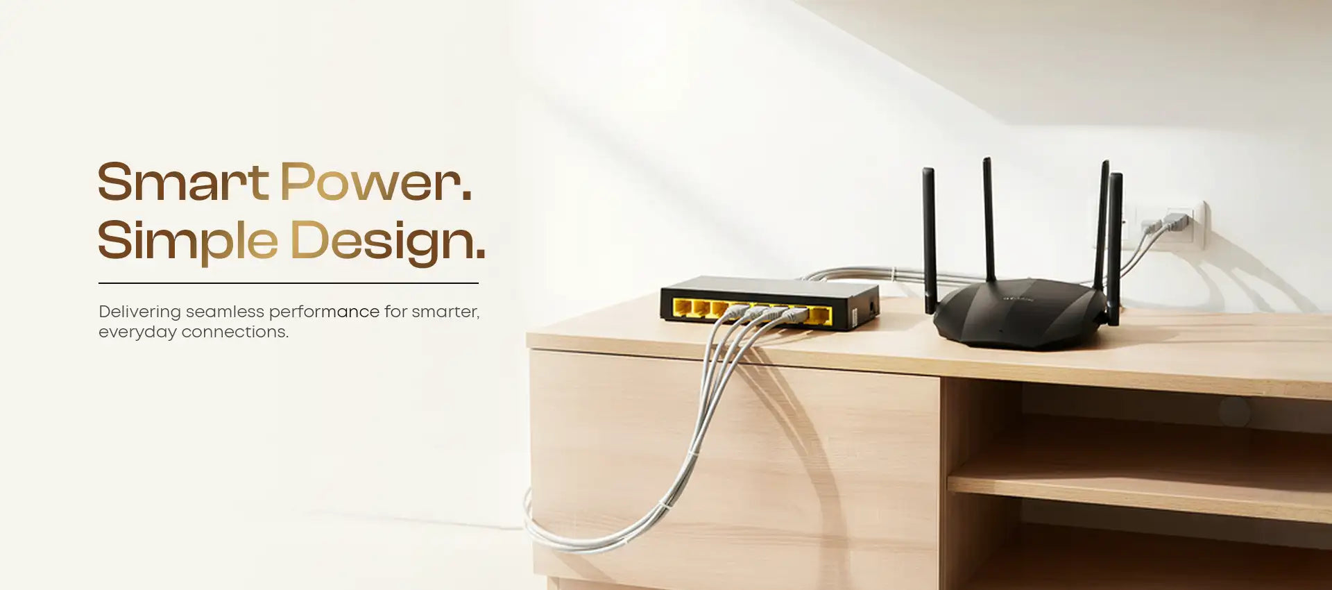 Black wireless router with four vertical antennas and a sleek, modern design.